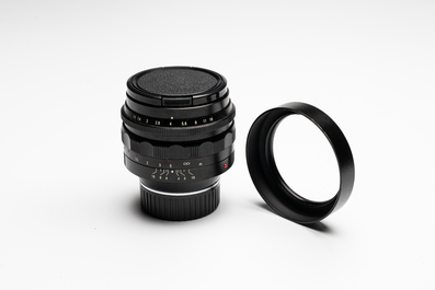 A Voigtl&auml;nder Nokton 50 mm F1.1 lens and hood