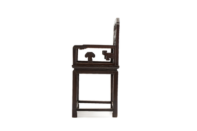 A Chinese carved hongmu armchair, 19th C.