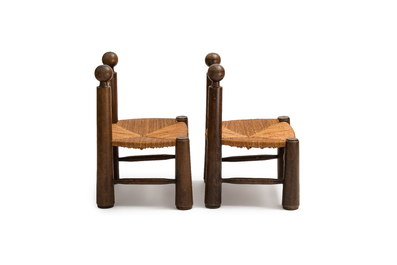 A pair of chairs in oak and straw, attributed to Charles Dudouyt, France, mid 20th C.