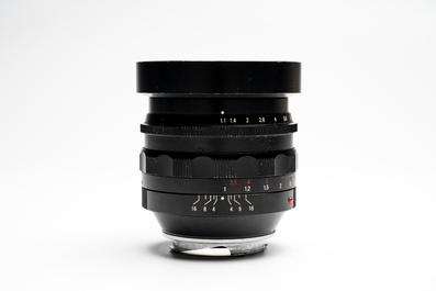 A Voigtl&auml;nder Nokton 50 mm F1.1 lens and hood