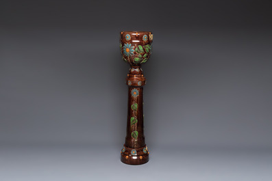 A very large Art Nouveau Flemish pottery four-piece jardini&egrave;re and stand, inscribed 'VREDE' and 'WELKOM', early 20th C.