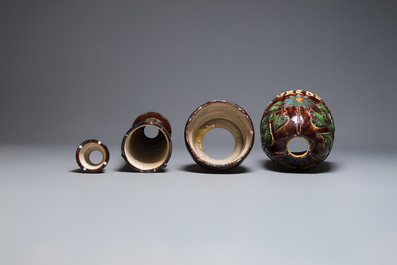 A very large Art Nouveau Flemish pottery four-piece jardini&egrave;re and stand, inscribed 'VREDE' and 'WELKOM', early 20th C.