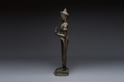 A large bronze Lopburi-style standing Buddha Shakyamuni, Thailand or Cambodia, 20th C.