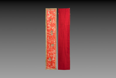 A pair of Chinese red-ground embroidered silk 'Eight Immortals' panels, 19th C.