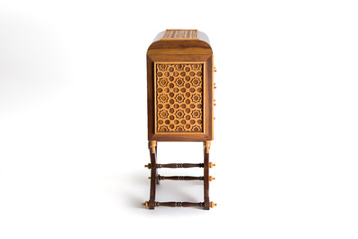 A Moorish-style wooden chest on stand with mirrors and geometric patterns, 20th C.