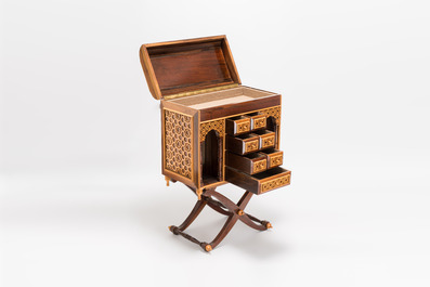A Moorish-style wooden chest on stand with mirrors and geometric patterns, 20th C.
