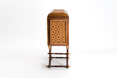 A Moorish-style wooden chest on stand with mirrors and geometric patterns, 20th C.