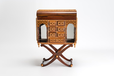 A Moorish-style wooden chest on stand with mirrors and geometric patterns, 20th C.