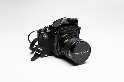 A Pentax 6x7 MLU with TTL prism, 3 lenses and accessories