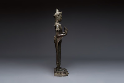A large bronze Lopburi-style standing Buddha Shakyamuni, Thailand or Cambodia, 20th C.