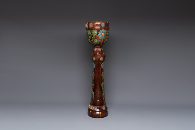 A very large Art Nouveau Flemish pottery four-piece jardini&egrave;re and stand, inscribed 'VREDE' and 'WELKOM', early 20th C.