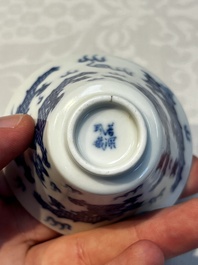 A pair of Chinese blue and white 'Bleu de Hue' 'Dragon' cups, Nhuoc Tham Tran Tang 若深珍藏 mark, 19th C.