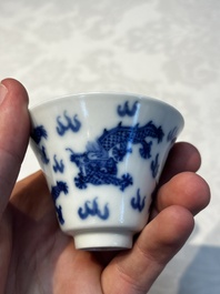A pair of Chinese blue and white 'Bleu de Hue' 'Dragon' cups, Nhuoc Tham Tran Tang 若深珍藏 mark, 19th C.