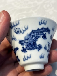 A pair of Chinese blue and white 'Bleu de Hue' 'Dragon' cups, Nhuoc Tham Tran Tang 若深珍藏 mark, 19th C.