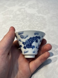 A pair of Chinese blue and white 'Bleu de Hue' 'Dragon' cups, Nhuoc Tham Tran Tang 若深珍藏 mark, 19th C.