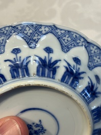 A Chinese blue and white 'Erotic Subject' saucer, Chenghua mark, Kangxi