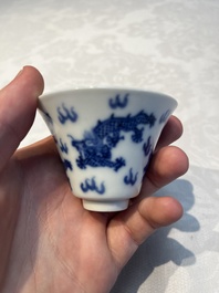 A pair of Chinese blue and white 'Bleu de Hue' 'Dragon' cups, Nhuoc Tham Tran Tang 若深珍藏 mark, 19th C.