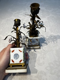 A pair of gilt silver and metal candlesticks with Chinese porcelain, European porcelain flowers, and marble bases, marked Boin-Taburet, late 19th C.