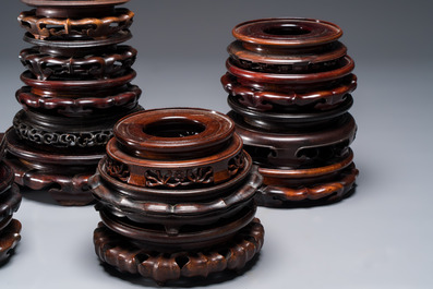 A collection of 20 Chinese wooden stands, 19/20th C.