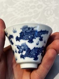 A pair of Chinese blue and white 'Bleu de Hue' 'Dragon' cups, Nhuoc Tham Tran Tang 若深珍藏 mark, 19th C.