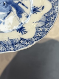 A Chinese blue and white 'Erotic Subject' saucer, Chenghua mark, Kangxi