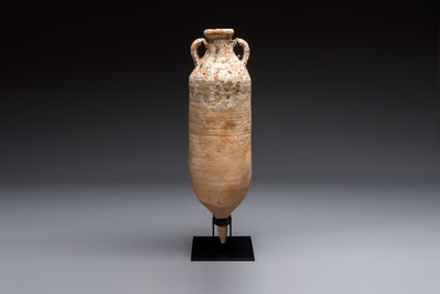 A large Roman pottery wine or fish oil transport amphora with marine encrustation, North Africa, 4/5th C.