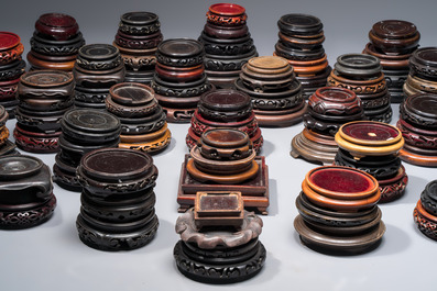 A collection of 111 Chinese wooden stands, 19/20th C.