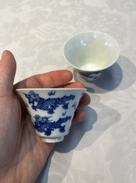 A pair of Chinese blue and white 'Bleu de Hue' 'Dragon' cups, Nhuoc Tham Tran Tang 若深珍藏 mark, 19th C.