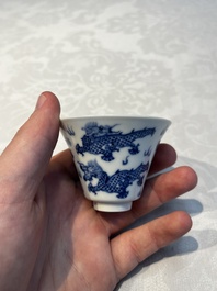 A pair of Chinese blue and white 'Bleu de Hue' 'Dragon' cups, Nhuoc Tham Tran Tang 若深珍藏 mark, 19th C.