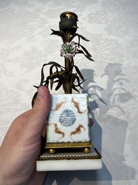 A pair of gilt silver and metal candlesticks with Chinese porcelain, European porcelain flowers, and marble bases, marked Boin-Taburet, late 19th C.