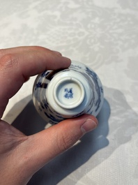 A pair of Chinese blue and white 'Bleu de Hue' 'Dragon' cups, Nhuoc Tham Tran Tang 若深珍藏 mark, 19th C.