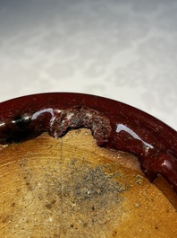 A Chinese flamb&eacute;-glazed bowl and a tripod censer, 19th C.