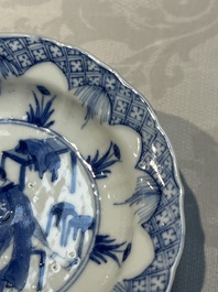 A Chinese blue and white 'Erotic Subject' saucer, Chenghua mark, Kangxi