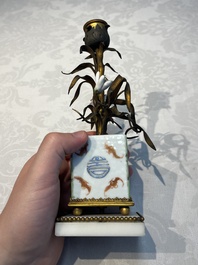 A pair of gilt silver and metal candlesticks with Chinese porcelain, European porcelain flowers, and marble bases, marked Boin-Taburet, late 19th C.