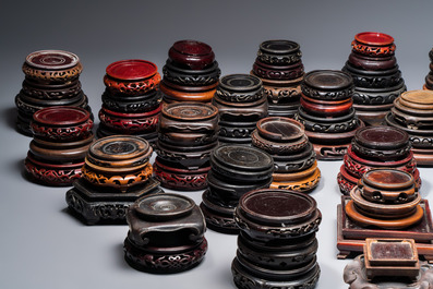 A collection of 111 Chinese wooden stands, 19/20th C.