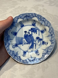 A Chinese blue and white 'Erotic Subject' saucer, Chenghua mark, Kangxi