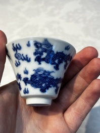 A pair of Chinese blue and white 'Bleu de Hue' 'Dragon' cups, Nhuoc Tham Tran Tang 若深珍藏 mark, 19th C.