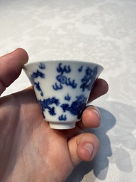 A pair of Chinese blue and white 'Bleu de Hue' 'Dragon' cups, Nhuoc Tham Tran Tang 若深珍藏 mark, 19th C.