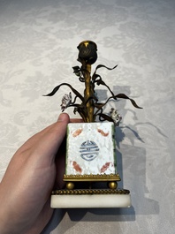 A pair of gilt silver and metal candlesticks with Chinese porcelain, European porcelain flowers, and marble bases, marked Boin-Taburet, late 19th C.