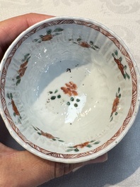 Seven Chinese famille verte cups and four saucers, conch shell and lingzhi marks, Kangxi