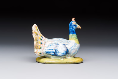 A polychrome Dutch Delft 'Peacock' cover, 18th C.