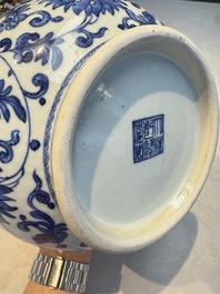 A Chinese blue and white 'Yuhuchunping' vase with lotus scroll design, Qianlong mark and of the period