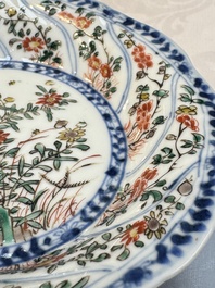 Seven Chinese famille verte cups and four saucers, conch shell and lingzhi marks, Kangxi