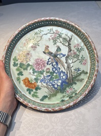 A fine Chinese famille rose pale celadon-ground 'phoenixes' dish with a reticulated rim, Qianlong