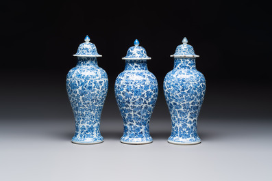 A Chinese blue and white five-piece garniture with floral design, Kangxi
