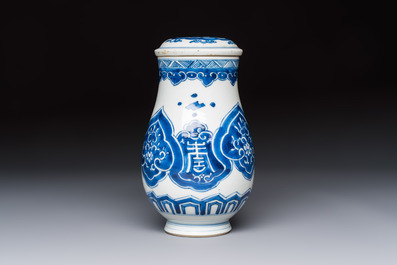 A Chinese blue and white covered vase and two bottle vases, Chenghua and jade marks, Kangxi