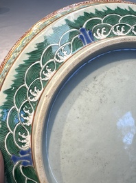 A fine Chinese famille rose pale celadon-ground 'phoenixes' dish with a reticulated rim, Qianlong