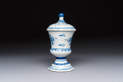 A blue and white inscribed Dutch Delft children's money bank, dated 1786