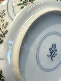 Seven Chinese famille verte cups and four saucers, conch shell and lingzhi marks, Kangxi
