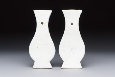 A pair of Chinese blue and white 'Antiquities' wall pocket vases, Kangxi